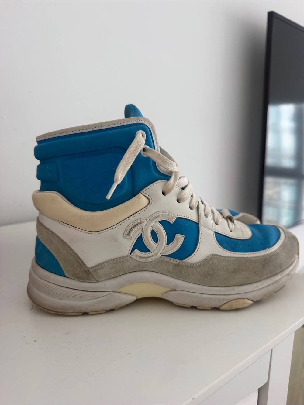 CHANEL Teal Blue and White High-Top Sneaker
